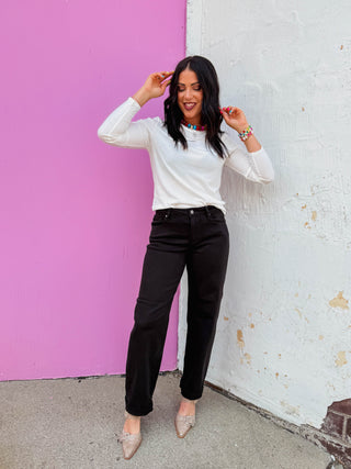 Logan Mid Rise Barrel Jeans