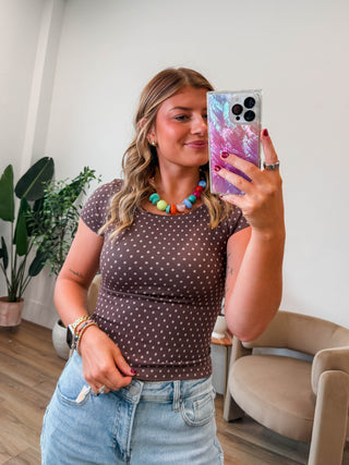 Flip your style with this versatile reversible polka dot top. Designed with a seamless construction and textured pattern, you get two looks in one. The short sleeves and stretchy fabric provide all-day comfort and ease of movement, making it perfect for layering or wearing solo. Available in rich brown and classic black — neutral tones that pair effortlessly with any outfit. Whether you're dressing up or keeping it casual, this top adapts to your needs.
house of color Autumn
house of color Summer