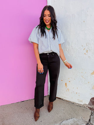 Logan Mid Rise Barrel Jeans