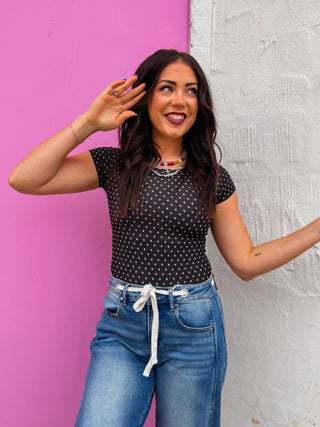 Flip your style with this versatile reversible polka dot top. Designed with a seamless construction and textured pattern, you get two looks in one. The short sleeves and stretchy fabric provide all-day comfort and ease of movement, making it perfect for layering or wearing solo. Available in rich brown and classic black — neutral tones that pair effortlessly with any outfit. Whether you're dressing up or keeping it casual, this top adapts to your needs.
shop by color season
house of color Winter