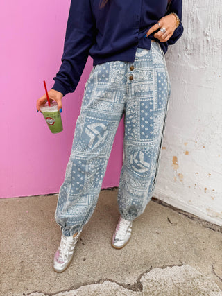 The Paisley Pop Joggers bring effortless style to your everyday wardrobe. The classic paisley pattern pairs seamlessly with any top, making these joggers perfect for year-round wear. Whether you're dressing up for a casual outing or keeping it comfortable at home, these joggers deliver an elevated look that works in any season. Soft, breathable fabric keeps you comfortable all day long, while the relaxed fit ensures easy movement. A versatile essential that transitions from season to season with ease.