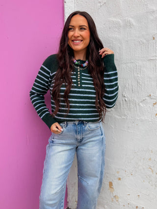The Taya Striped Sweater is a versatile long sleeve top with a round neckline and front button detail. Soft ribbed trim frames the neckline, cuffs, and hem for a polished finish. The trendy pine green base with light blue stripes creates an eye-catching look that transitions effortlessly from work to weekend. Perfect for layering or wearing solo.
house of color Winter
shop by color season