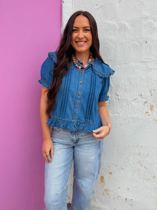 The Willa Denim Top combines timeless style with playful details. This classic denim blouse features a charming Peter Pan collar and short puff sleeves that add dimension and movement. The button front closure allows for easy layering, while delicate ruffle detailing brings a refined feminine touch. Crafted in a versatile medium wash, it pairs effortlessly with jeans, skirts, or tailored trousers for a look that works from casual outings to relaxed office settings.
house of color Summer
shop by color season