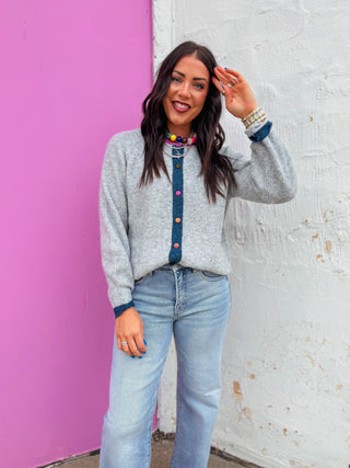 Cozy meets chic with this Tayler Cardigan, a fuzzy button-down sweater perfect for layering. Featuring a crew neck, long sleeves, and color-trimmed details that add visual interest. Multi-color buttons add a playful touch to this soft, touchable piece. Effortlessly transition from casual to polished—wear it open over your favorite tee or buttoned up as a standalone layer. An everyday essential with personality.
house of color Summer
shop by color season