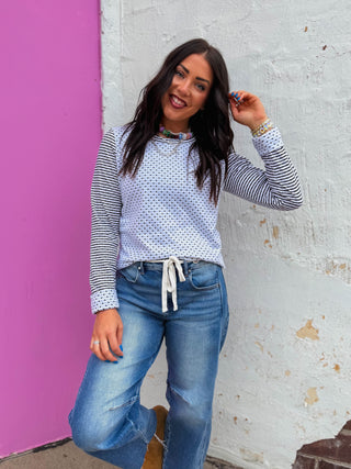 Discover the perfect blend of playful style and everyday versatility with the Pattern Play Top. This long sleeve features a mix of polka dots and stripes that brings personality to your wardrobe. Effortlessly transition from office days to weekend adventures—pair it with tailored pants for work polish or dress it down with your favorite jeans. A fun, feel-good piece that proves work-to-weekend dressing doesn't have to be complicated.
house of color Winter
shop by color season