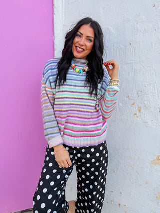 The Rainbow Wishes Sweater is ready to brighten your fall wardrobe. This bestselling rainbow stripe knit now comes in a cozy mock neck silhouette that's perfect for fall and winter. Supremely comfortable and endlessly versatile, it adds an instant pop of color and personality to any outfit—wear it with your favorite denim or trousers for the perfect fun look! 
house of color Summer
shop by color season