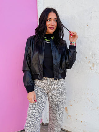 A sleek faux leather bomber jacket featuring a classic zip-front closure, side pockets, and ribbed trim at the collar, cuffs, and hem. Designed with an easy, slightly relaxed fit, this versatile layering piece adds an effortlessly cool finish to both casual and dressed-up looks.
house of color Winter
shop by color season