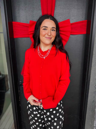 Elevate your wardrobe with this charming Liza Knit Top Cardigan, featuring a classic Peter Pan collar and long sleeves for timeless elegance. The button front closure allows easy layering, while the waist-length cut flatters your silhouette. Crafted in a pretty red hue, this trendy piece effortlessly transitions from casual to polished looks, making it the perfect addition to any style-savvy closet.
shop by color season