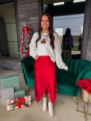 Add a touch of effortless romance to your wardrobe with this eye-catching satin skirt. Cut from a silky satin, this piece features an alluring diagonal hemline accentuated by delicate lace trim. Designed with a flattering high-waist fit, it offers a sleek silhouette that transitions seamlessly from day to night. Style it with a blouse for an elegant evening look, or pair it with an oversized knit sweater and boots for a chic, textured look.
house of color Summer
house of color Winter
shop by color season