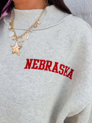 Nebraska Embroidered Mock Neck