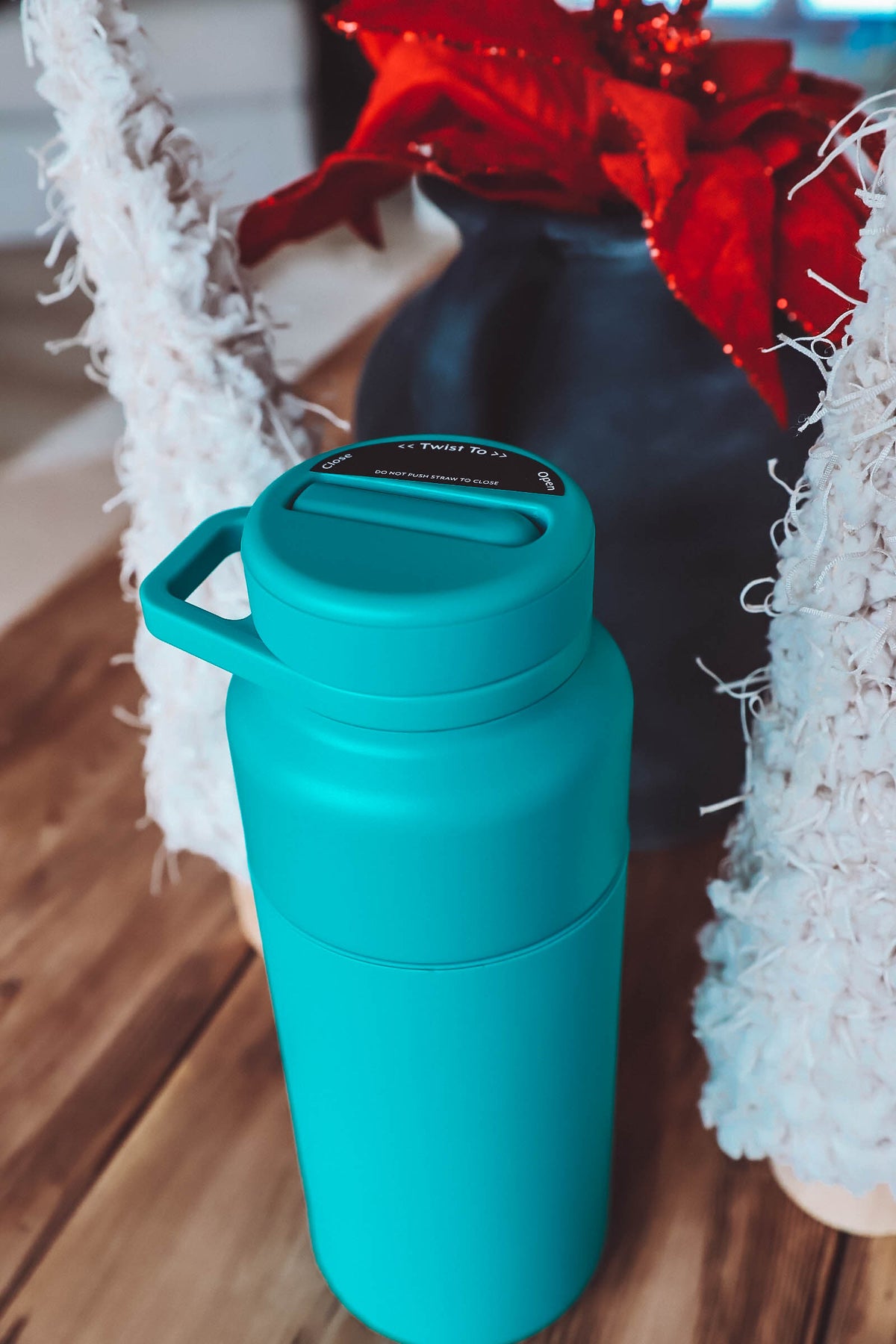 BruMate's Rotera Water Bottle Twists Open